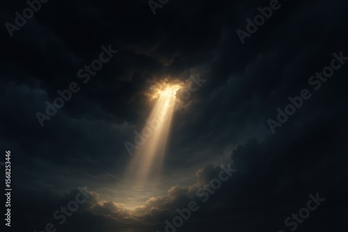 Sunlight breaking through dark storm clouds with dramatic rays over ocean horizon