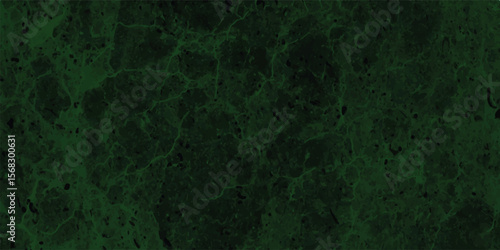 Green veined marble texture with dark accents illustrating natural stone variations in elegant decorative design.