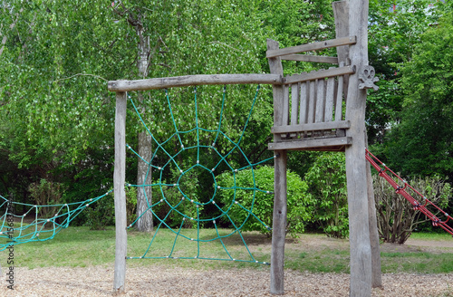 climbing frame with green net in a playground im park