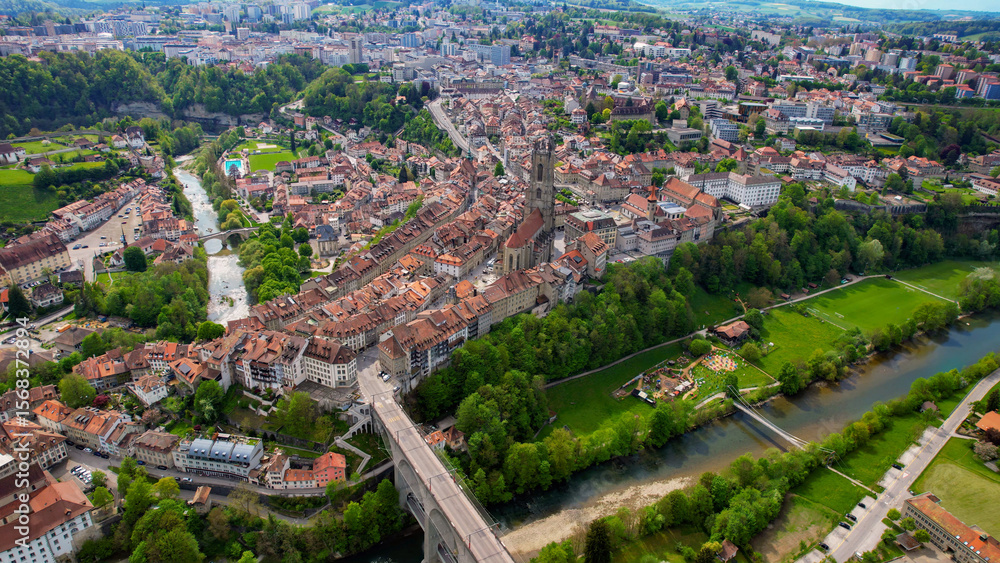Panoramic aerial of the old town of the city Fribourg in Switzerland on a sunny noon in summer Panoramic aerial of the old town of the city Fribourg in Switzerland on a sunny noon in summer
