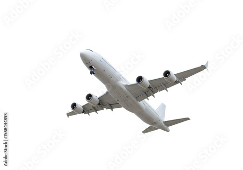 White Passenger Airplane Flying Against Black Background isolated on a transparent background