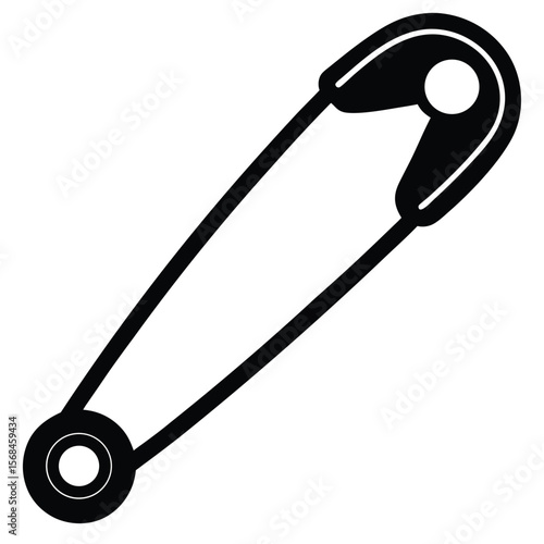 Black safety pin with white circles metal fastener