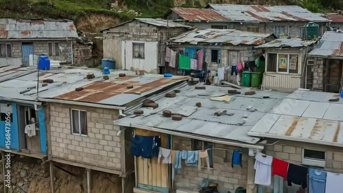 Wallpaper Mural A dense collection of informal housing structures clings to a steep hillside Torontodigital.ca
