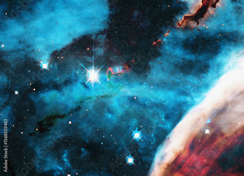 Fototapeta Naklejka Na Ścianę i Meble -  A vivid cosmic scene showcasing a nebula with glowing stars, swirling clouds of gas, and contrasting shadows. Elements of this illustration were furnished by NASA.