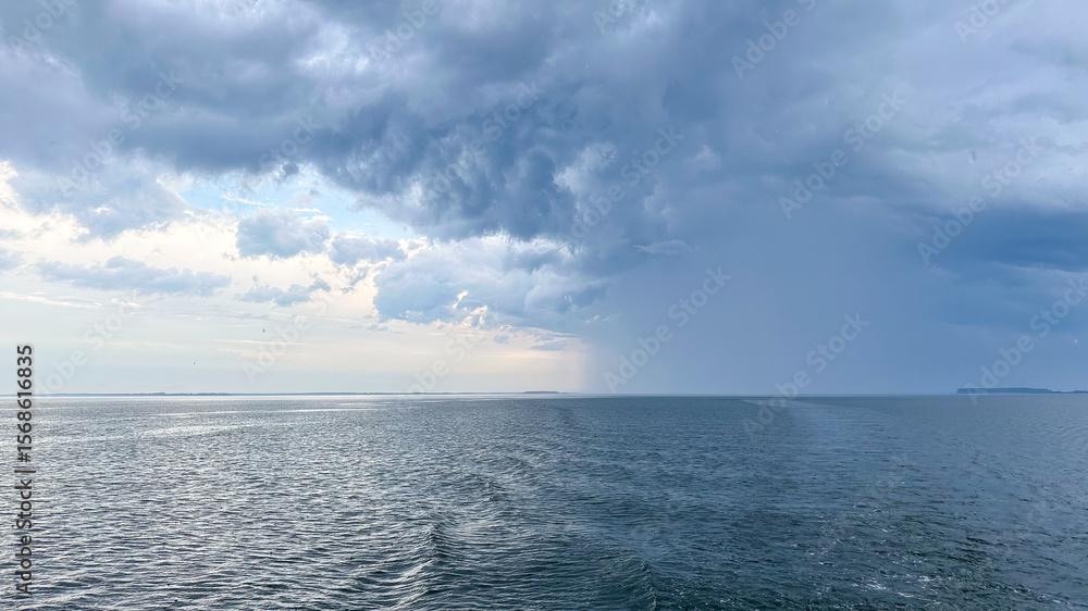 Αυτοκόλλητο A closeup view of a an isolated squall over the Chesapeake Bay as seen from the