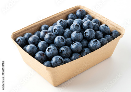 Blueberry in a cardboard tray on white background
