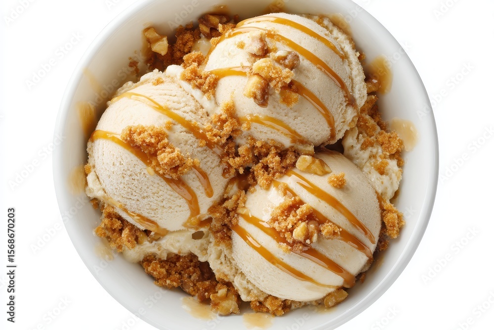 Top view of ice cream scoops with caramelized walnuts and maple syrup garnished with caramel sauce and cookie crumbs on a white background Top view of ice cream scoops with caramelized walnuts and maple syrup garnished with caramel sauce and cookie crumbs on a white background