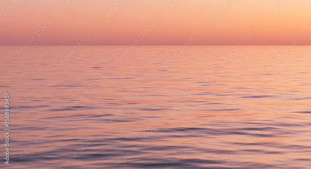 Fototapeta premium Soft ocean ripples in a pastel pink-orange gradient at sunrise