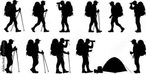 Silhouette of hikers trekking with backpacks and tent camping outdoor adventure travel concept