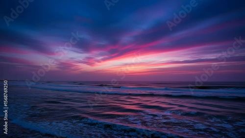 Vivid Ocean Sunset with Waves and Colorful Sky in Twilight Serene Seascape and Tranquil Shoreline