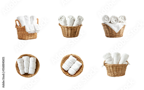 Collection of white hand towels in a wicker basket top view isolate on transparency background