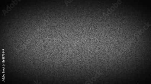 Static grainy noise background with dark vignette and textured gray appearance