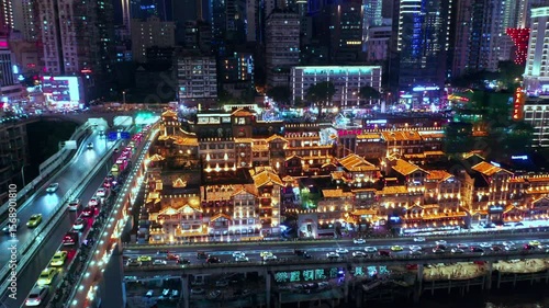 Exploring the vibrant night view of Hongyadong in Chongqing illuminated by dazzling lights
