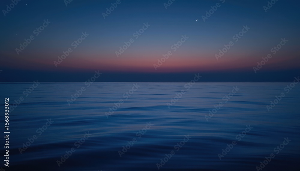 Obraz premium Tranquil Ocean Scene at Dusk with Soft Waves and Colorful Sky Gradation