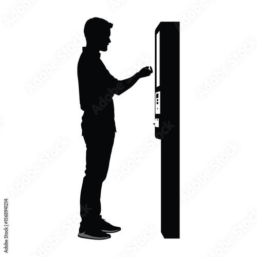 Silhouette of Person Interacting with Kiosk Screen