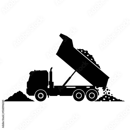 Silhouette of a dump truck unloading gravel or dirt onto the ground, with the truck bed raised.
