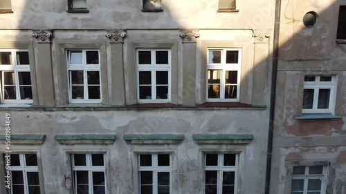 Tenement houses, windows and building's facades. City center of Wroclaw, Poland.