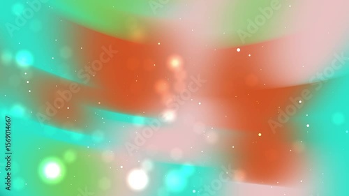Abstract blurred background with soft light spots orange aqua and green hues