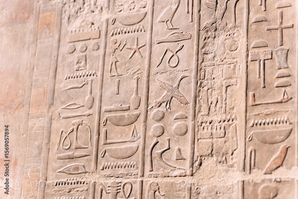Ancient egyptian hieroglyphs carvings showing figures and symbols Ancient egyptian hieroglyphs carvings showing figures and symbols