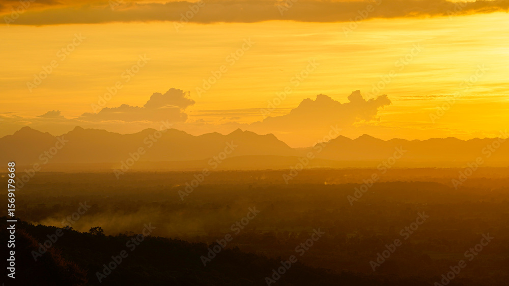 Obraz premium Golden sunset sky clouds in the evening sunrise.