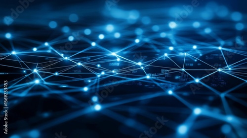 Blue lines on a dark background show a computer chip's connections.  It's a simple image representing computer technology.
