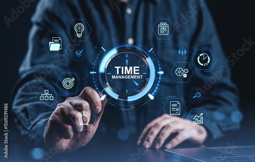 Wallpaper Mural Time management concept with digital icons around businessman using virtual interface on dark background in futuristic business productivity theme. Torontodigital.ca