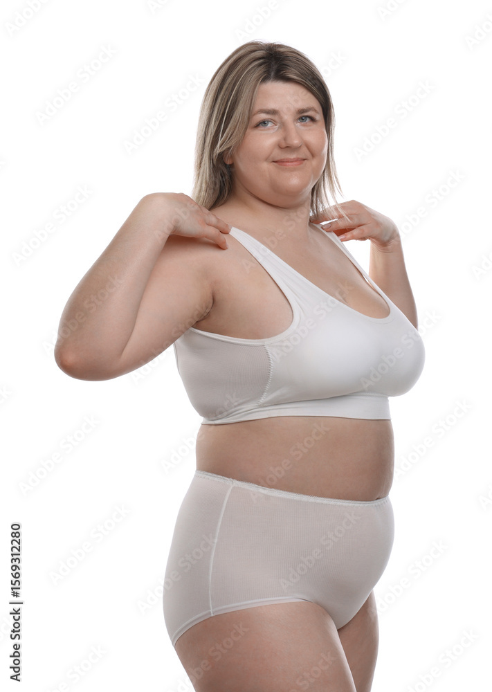 Obraz premium Weight loss. Plus size woman in underwear on white background