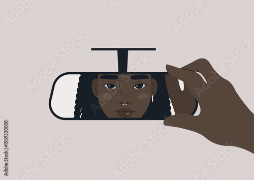 Capturing moments in the rear view mirror, a reflection of self and confidence on a serene journey on a quiet road