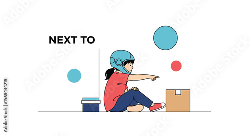 A young girl wearing a blue helmet points towards a brown cardboard box next to her