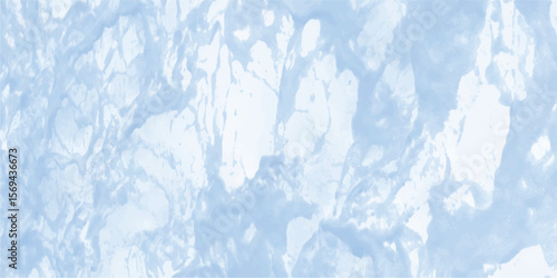 Watercolor texture in blue hues with flowing and splattered paint elements evoking a sense of movement and artistic impression