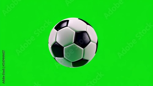 Classic Black and White Soccer Ball Floating on Green Screen Background For Sports Themed Graphics and Compositions