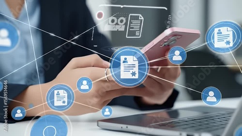 Close Up of Hands Using Smartphone with Digital Overlay on White Table Next to Laptop for Business and Communication in Modern Style