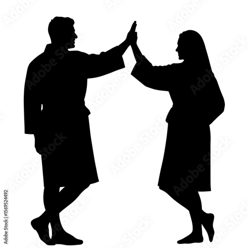 Silhouette of couple high-fiving in bathrobes, lighthearted spa bonding celebration