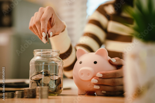 A woman holds a piggy bank, which symbolizes savings, financial planning, and economic challenges. Budgeting, investing, and money management for a secure future.