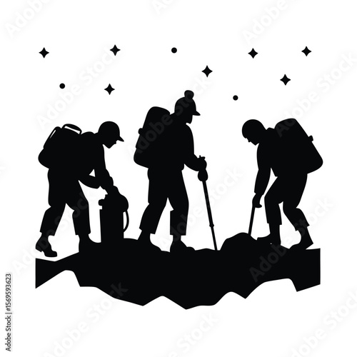 Black silhouette of hikers adjusting gear on rocky terrain under starry sky