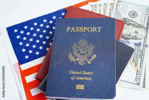US passport issued to citizen and national of the United States of America to travel in most countries outside with USA flag and dollar money.