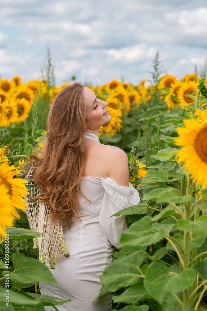 girl in white dress in sunflower field girl in white dress in sunflower field