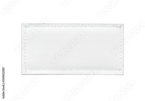A blank white fabric label with stitched edges is isolated on transparent background