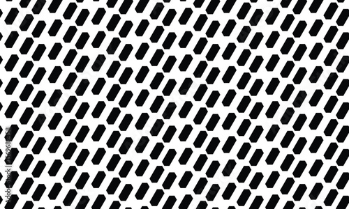 Abstract black and white geometric pattern of slanted, elongated hexagons creating a dynamic visual texture.
