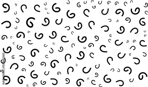 Abstract pattern of scattered, stylized, black letter 