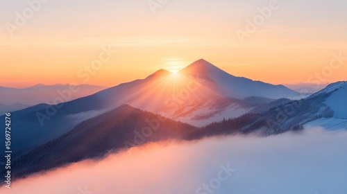 Wallpaper Mural A breathtaking view of mountains with a stunning sunrise, surrounded by clouds and a vibrant sky. Torontodigital.ca