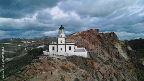 Aerial view of Lighthouse on rocky hill, Greece.