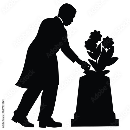 Silhouette of a Man Placing a Flower on a Grave Showing Respect and Mourning a Loss