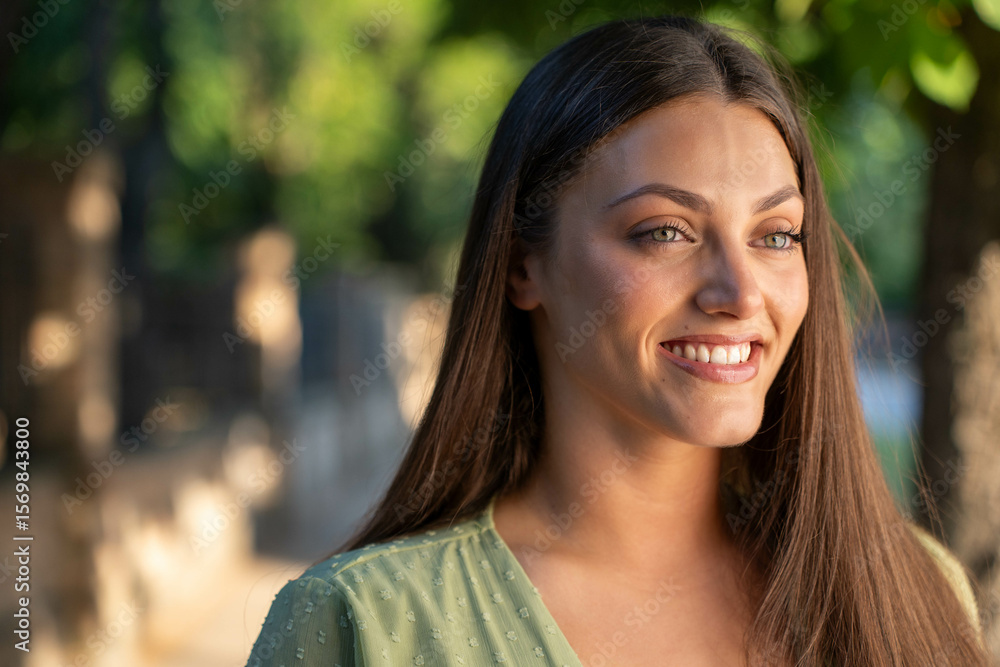 Close up portrait of beautiful Gen Z young woman outdoors, smiling with cheerful expression and natural positive energy Close up portrait of beautiful Gen Z young woman outdoors, smiling with cheerful expression and natural positive energy