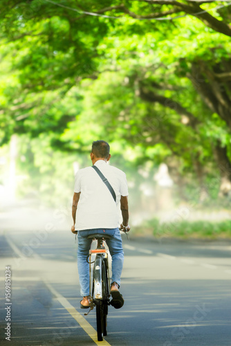 Wallpaper Mural man riding a bike Torontodigital.ca