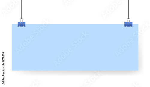 Blue sheet of paper note hanging on binder clip. Long wide banner with panoramic orientation. Light blue background