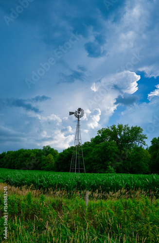 Dramatic stormy skies with vintage windmill.