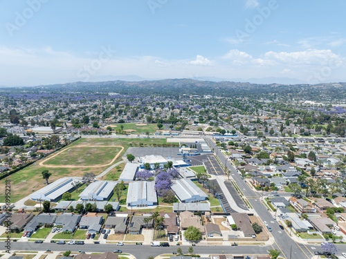 Canvastavla Day time aerial view of the Uptown area of Whittier with house and street, Calif