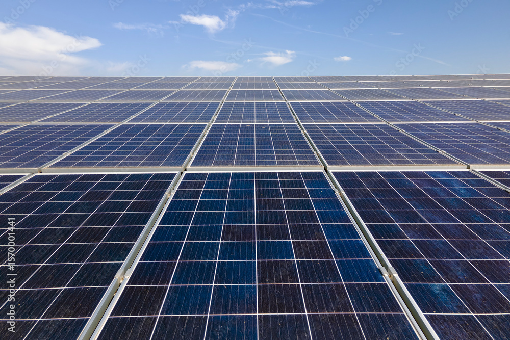 Office building with solar roof. Blue photovoltaic panels for producing clean ecological electric energy. Investing in renewable electricity concept Office building with solar roof. Blue photovoltaic panels for producing clean ecological electric energy. Investing in renewable electricity concept