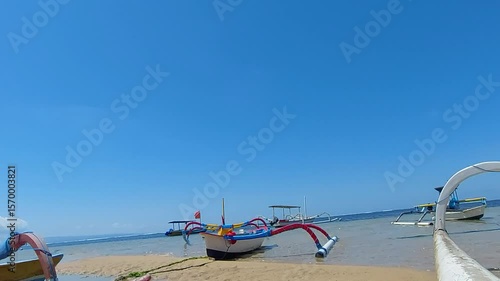Beach Lifestyle and Traditional Boats in Sanur, Bali